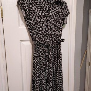 Laura Petite size 4 checkered design dress with attached belt.